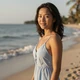 Thi, a 33-year-old Asian woman on a beach on MagnoliaDate international dating site